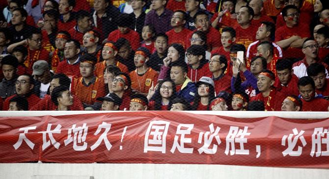 关于国足同心协力合作，夺得胜利的信息